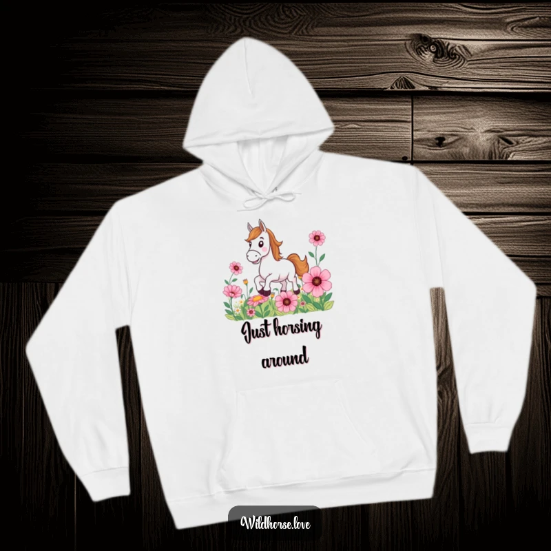 Funny Horse Hoodie: A grinning horse is captured mid-gallop amidst a whimsical field of oversized, colorful flowers, offering cozy charm.